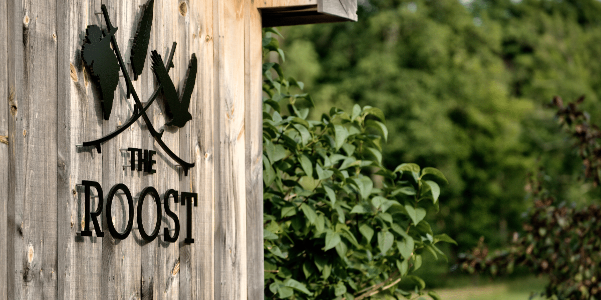 The Roost tasting room with logo