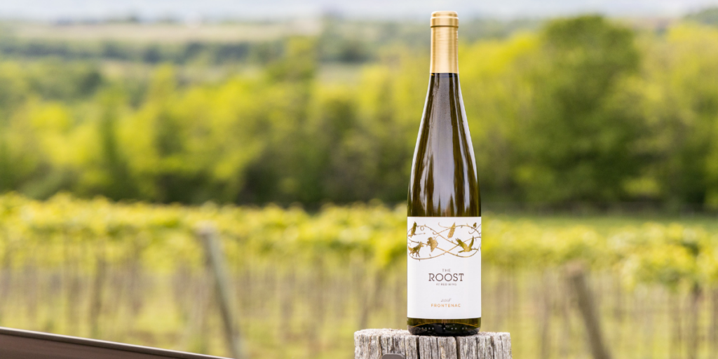Bottle of Frontenac wine at the Roost winery overlooking the vineyard